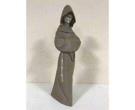 A Lladro figure of a monk