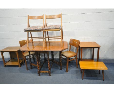 AN OAK BARLEY TWIST GATE LEG TABLE, with canted corners, open length 122cm x closed length 46cm x depth 90cm x height 77cm, w