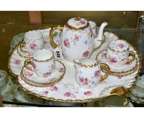 AN EARLY AYNSLEY COFFEE SET AND MATCHING TRAY  decorated with rambling roses and forget-me-nots, comprising one coffee pot wi