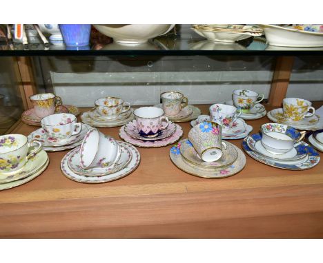 TWELVE AYNSLEY TRIOS, including antique and vintage china, mainly floral patterns in different styles to include Daffodil, B3