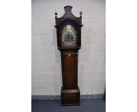 A GEORGE III OAK EIGHT DAY LONGCASE CLOCK, the shaped hood with floral fretwork design, glazed door enclosing a brass 11 inch