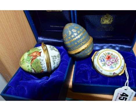 THREE HALCYON DAYS ENAMEL TRINKET BOXES, two boxed, comprising  a boxed circular trinket box, the lid decorated with wild flo
