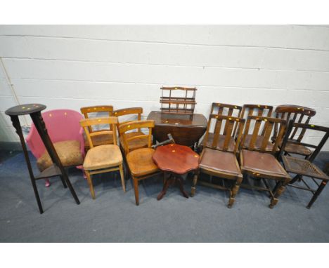 AN OAK GATE LEG TABLE, a large selection of dining chairs, comprising a set of four oak chairs with drop in seat pads, anothe