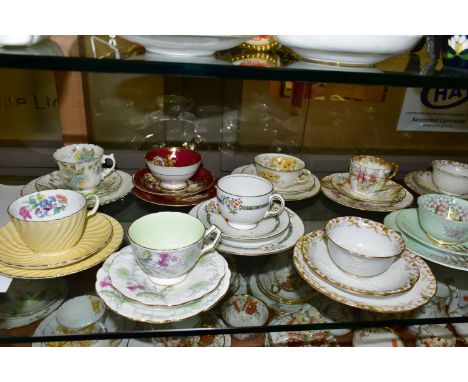 TWELVE AYNSLEY TRIOS, including antique and vintage china, floral patterns in different styles to include Orchid, Marguerite,