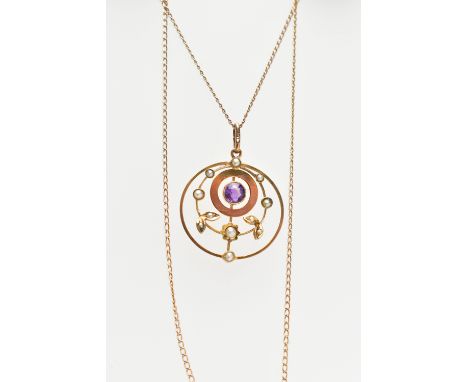 AN EDWARDIAN YELLOW METAL GEM SET PENDANT, the pendant set with a principal amethyst, millegrain set, with seed pearl and pet