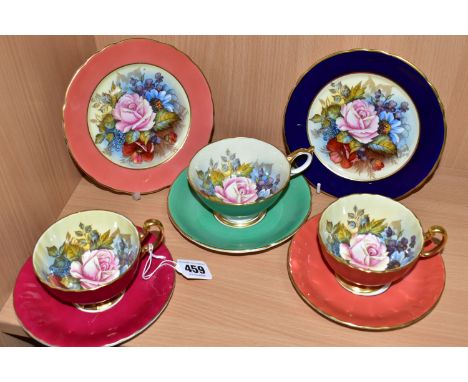 THREE AYNSLEY FLORAL DECORATED TEA CUPS AND SAUCERS BY J. A. BAILEY, with two tea plates, wavy rims, cups having solid colour