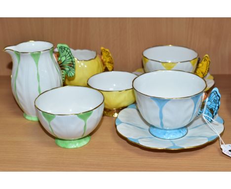 EIGHT PIECES OF AYNSLEY BUTTERFLY HANDLED TEA WARES, moulded in petal-like sections, comprising a small yellow cream jug heig