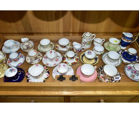 A COLLECTION OF AYNSLEY COFFEE CANS, COFFEE CUPS, TEA CUPS. SAUCERS, CREAM JUGS, SUGAR BOWLS, ETC, including an Imari pattern