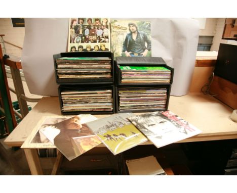 FOUR RECORD CASES CONTAINING OVER ONE HUNDRED AND FORTY LPs AND 12in SINGLES including Moody Blues, U2, Eric Clapton, Joni Mi