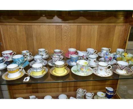 A COLLECTION OF TWENTY FOUR AYNSLEY COFFEE CANS / CUPS AND SAUCERS AND A CREAM JUG, assorted patterns, including a late 19th 