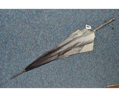 A CHINESE SILVER AND GREY UMBRELLA/PARASOL, with a white metal handle embossed with Dragons, length 76cm (1)