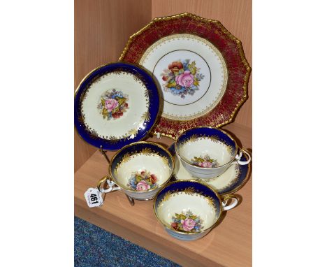 AN AYNSLEY CABINET PLATE, TEA CUPS AND SAUCERS BY J. A. BAILEY, with wavy rims, the cups having a white exterior and signed f