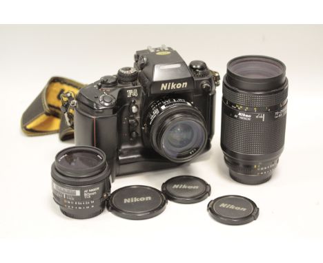 Nikon F4 Outfit, camera with F2.8 24mm, F1.8 50mm , F4-5.6 70-210 AF Nikkor lenses also an SB24 flashgun