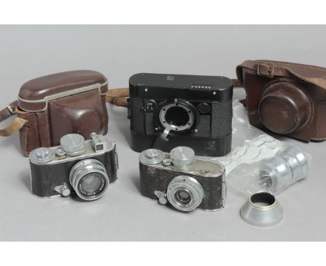 Robot 1 Cameras, a pair, one with 4cm F2 Biotar the other with a 3cm F2.8 Tessar also a 7.5cm Tele-Xenar and a 36DNP camera b