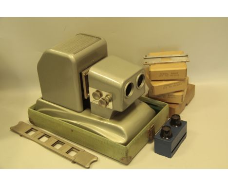 A Pintsch Bamag Duplex Projector, with a pair of Wetzlar F2.5 80mm lenses, original slide carrier and more. 