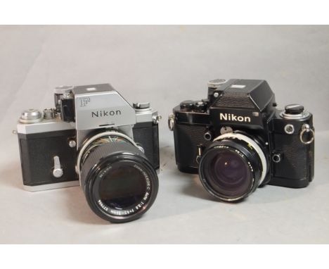 A Pair of Nikon F SLRs, Nikon F Photomic T Camera together with a Nikkor C Auto 43-86mm F3.5 Zoom lens and a Black Nikon F2 P