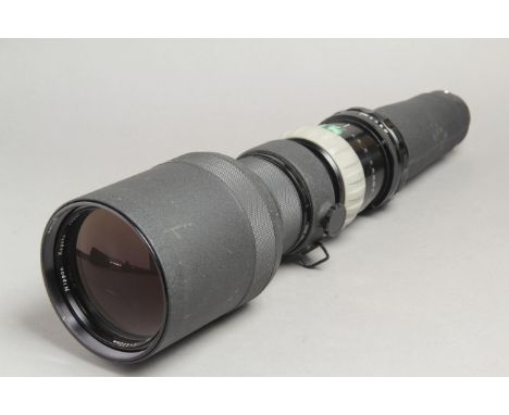 A Nikkor 600mm F5.6 Lens,  nesting' type, first version, in a soft case