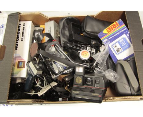 Various Camera Accessories,  Including slide accesories, lens hoods, filters, cleaning items, polaroid cameras and a 8 mm cam