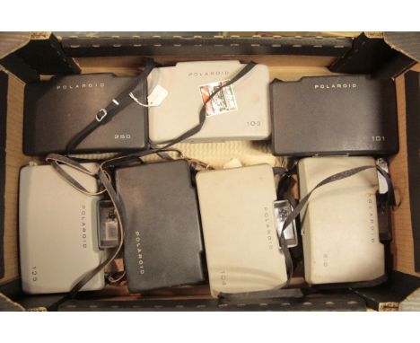 Polaroid Land Cameras, Various different models, one carrying a label from the Home office Scientific Research and Developmen