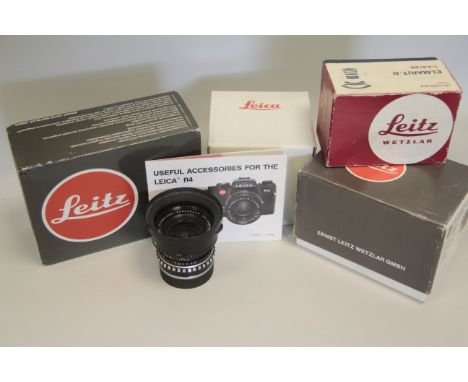 Leica PA-Curtagon R 4/35mm, together with an assortment of Leica boxes and cases.
