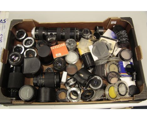 Various Lens, enlargers, filters and hoods, Including macro, tele, fixed with assorted hoods, filters and adapters included 