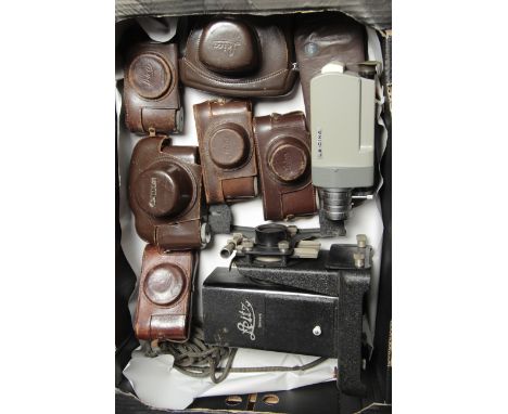 Leica Cases,  a range of camera ever ready cases with a Leicina SV and the remains of a VIIIa projector (a lot)