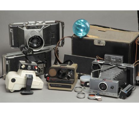 Polaroid Cameras, a model 100 outfit with lenses, filters, flash etc also a Thompson conversion with a Dallmeyer lens and oth