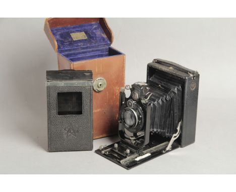 Ica Orix (308) Camera, double extentsion 10x 15 film size, fitted with a 16.5cm F4.5 Tessar lens, 'Westminster' retailers pla