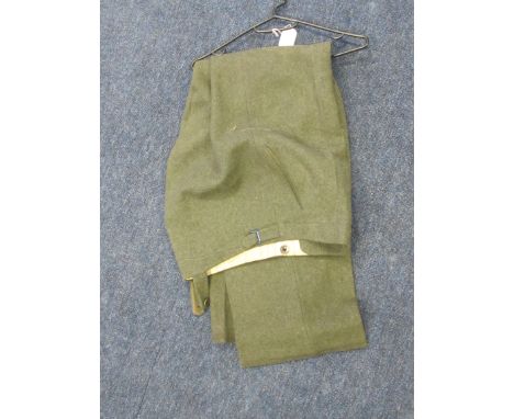 German Uniform - Standard German army issue trousers with plastic buttons in service green finish. Minor holes and surface we