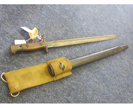 Bayonet: P07 bayonet by Sanderson dated May 1916. Pommel marked 'AS OTC 28'. In its steel mounted leather scabbard and webbin