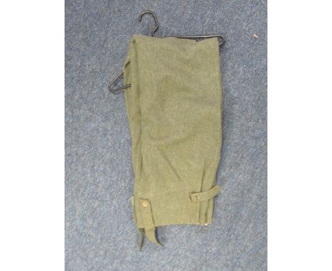 German Uniform - Standard German army issue trousers with period replacement buttons in standard green finish. Minor holes an