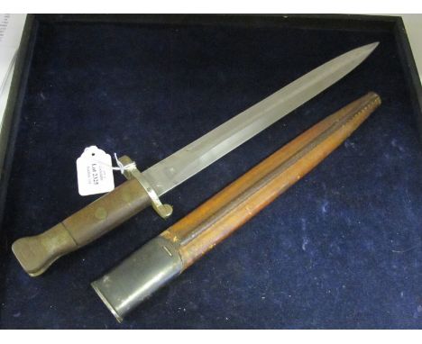 Bayonet: 1888 Pattern MK1 2nd Type in its MKII scabbard with integral chape. Ricasso dated 1895. Sold out of service mark. Go