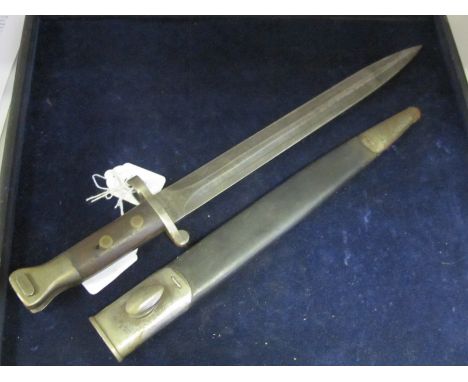 Bayonet: 1888 Pattern MKI 2nd Type (oil hole in grips) in its MKI steel mounted leather scabbard. Unit marking 1 V.N. to pomm