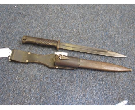 Bayonet: Germany 3rd Reich 1884/98 Knife bayonet with metal scabbard and leather frog. Makers initials 'jwh' (unusually made 