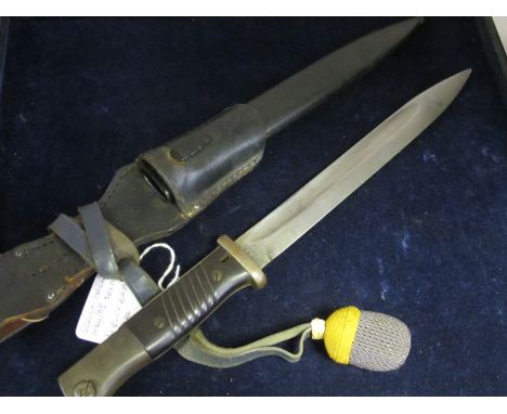 Bayonet: Germany 3rd Reich 1884/98 Knife bayonet with leather frog, metal scabbard and troddel. Maker on ricasso 'W.K.C.' (We