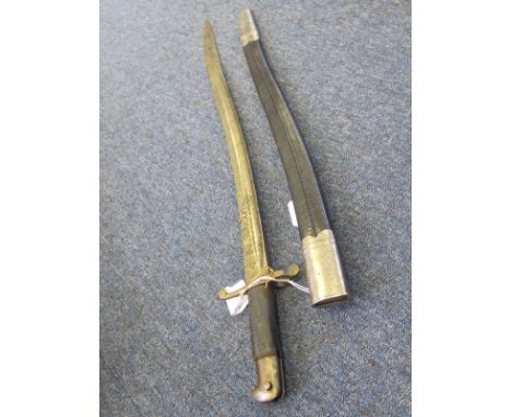 Bayonet: A British Pattern 1856 Volunteer Sword bayonet. Blade engraved 'PARKER FIELD & SONS 233 HOLBORN LONDON'. In its stee