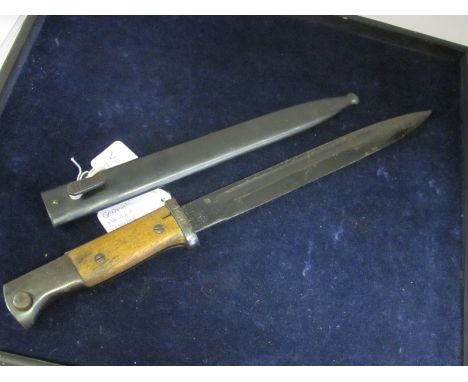 Bayonet: German 3rd Reich Pattern 1884/98 knife bayonet. Ricasso marked 'P.R.8' Blued scabbard and blade. (Blade slightly uns