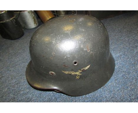 German Headwear - M40 single decal Luftwaffe helmet, second pattern eagle, temple stamp ET 60. Rear stamp 1246, original line