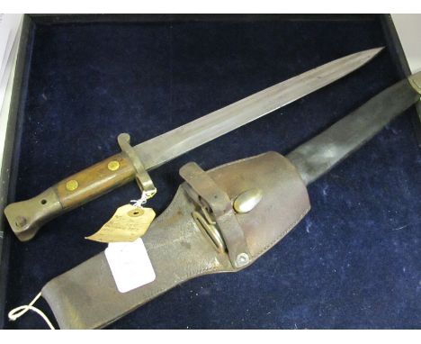 Bayonet: 1888 Pattern MKII in its MK I scabbard (minor shrinkage to leather) Sound condition overall. With leather frog.