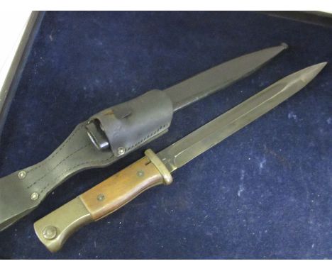 Bayonet: German 3rd Reich Model 1884/98 knife bayonet in its steel scabbard (painted black) Maker possibly ? CKL (Eisen Huett