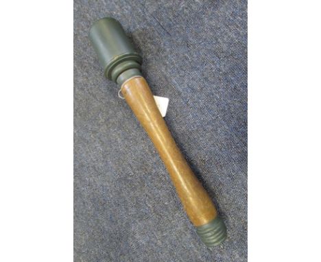 German practice stick grenade standard blue top, Waffen eagle marked, fixed base cap.