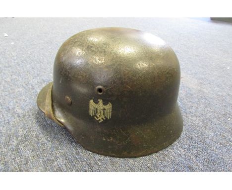 German Headwear - M 40 single decal German army helmet, rear shell stamp 1123, temple stamps ST 64, good complete liner and c