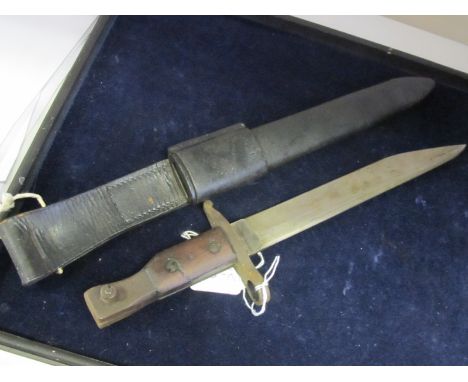 Bayonet: Canadian Ross rifle bayonet MKII dated February 1916. In its leather scabbard with integral frog. Good condition ove