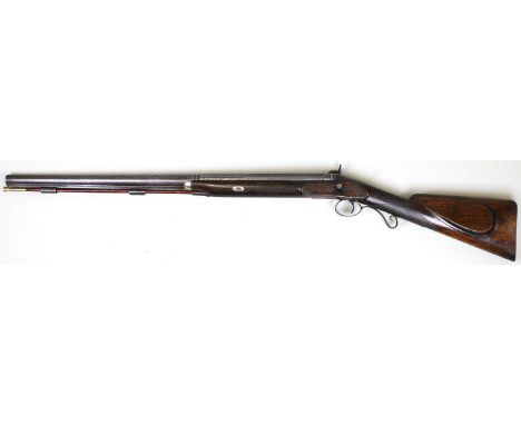 Gun: A fine single barrelled percussion shotgun by 'Fotherby.' Part octagonal, part round Damascus barrel 28". Good walnut ha