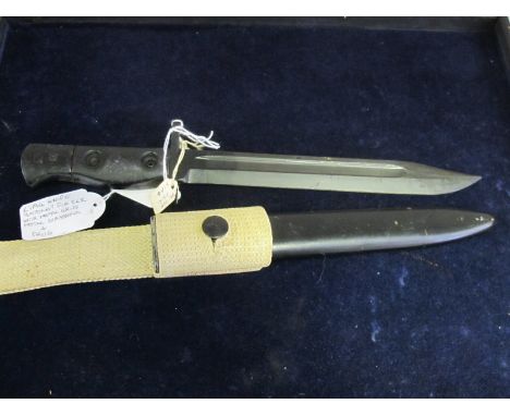 Bayonet: British LIA 4 (commercial) unmarked. Bowie blade 8". Metal grip. In its steel scabbard with webbing frog. For the S.