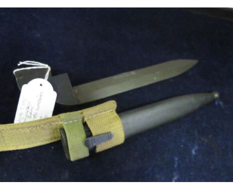 Bayonet: A No9 bayonet for the No4 Rifle, unfullered blade. In its steel scabbard and webbing frog. Good condition. 
