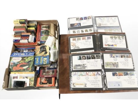 Three albums of first day covers, playing cards, collector's cards and booklets, two die cast cars etc (2 boxes)