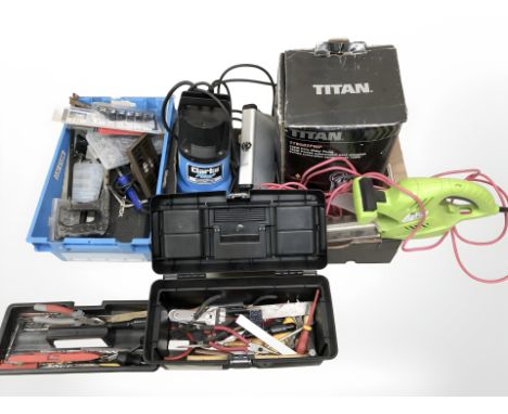 An electric hedge trimmer, Clark and Titan water pumps, hand tools and hardware, Stanley tool box etc 
