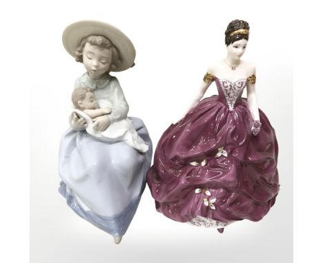 A Coalport figure 'Emma' numbered 4252/7500 and Nao figure of a girl holding a baby boy 
