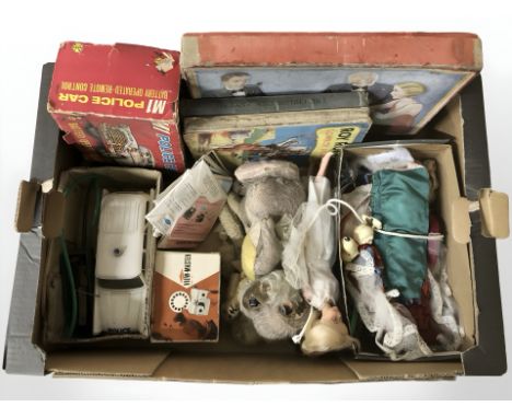 A group of vintage toys, teddy bears, viewmaster, battery operated remote control police car, etc. (1 box)